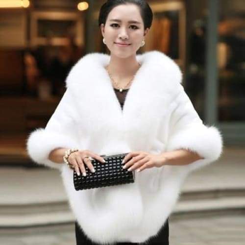 Luxe Dames Poncho Imitatiebont