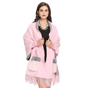 Dames Poncho met Bontzakken