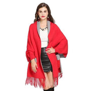Dames Poncho met Bontzakken