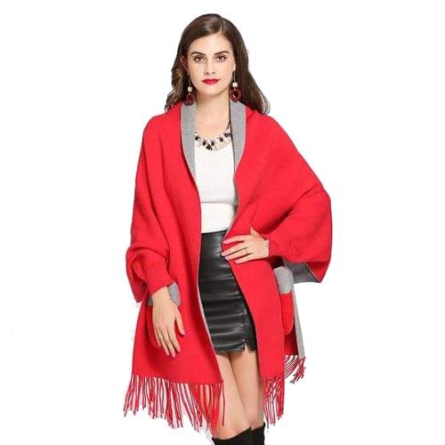 Dames Poncho met Bontzakken