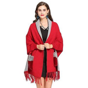 Dames Poncho met Bontzakken